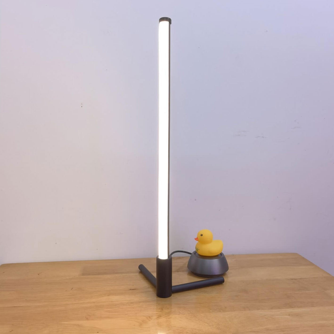 Minimalist LED Table Lamp with Adjustable Light Settings