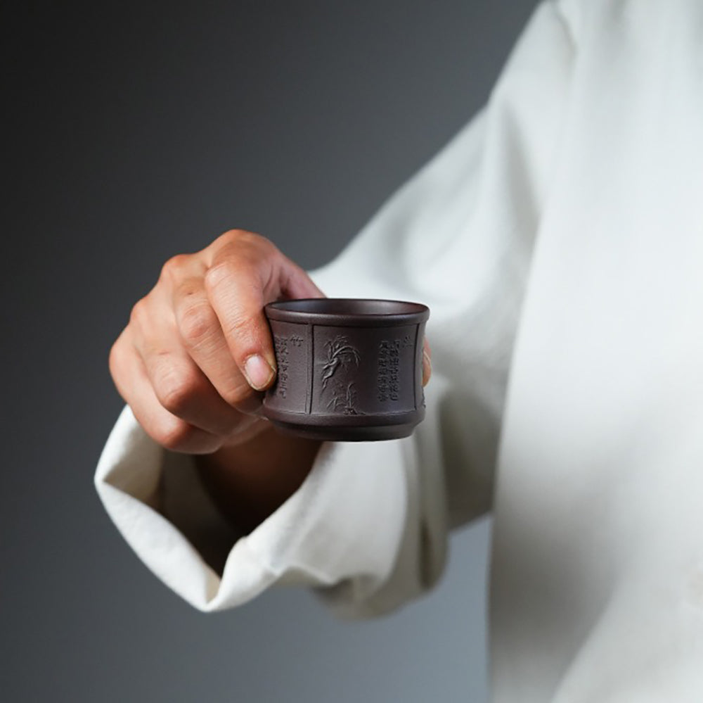 Yixing Purple Clay Tea Cup Set with Plum Blossom, Orchid, Bamboo, and Chrysanthemum Motifs