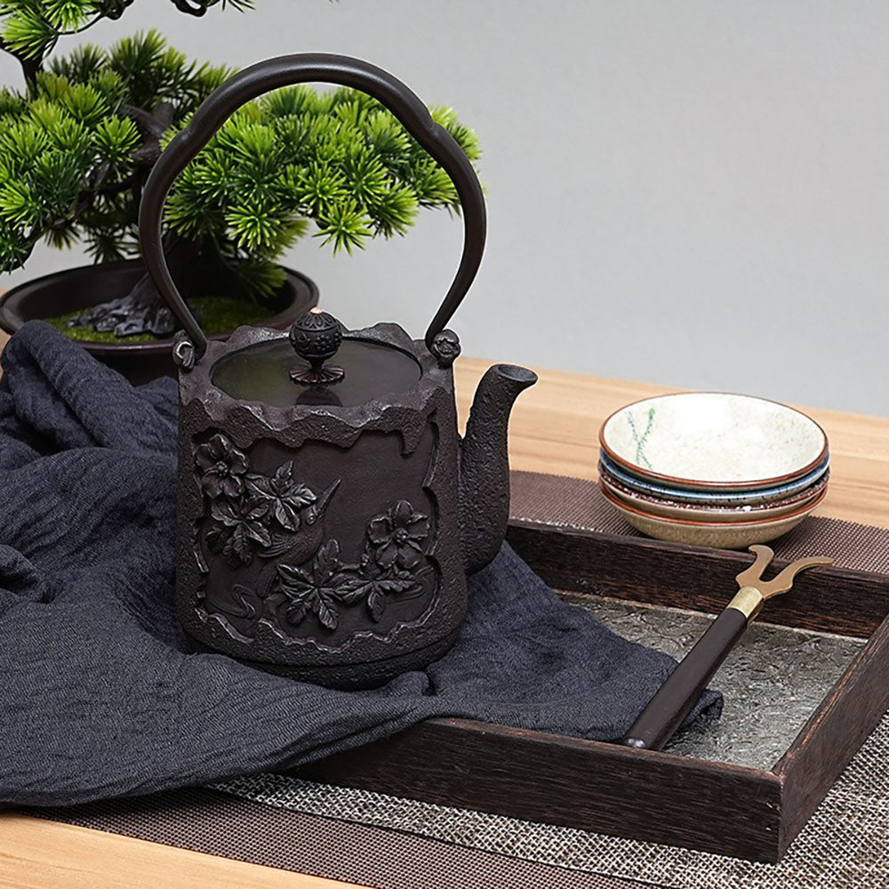 Japanese Cast Iron Teapot with Magpie and Blossom Design