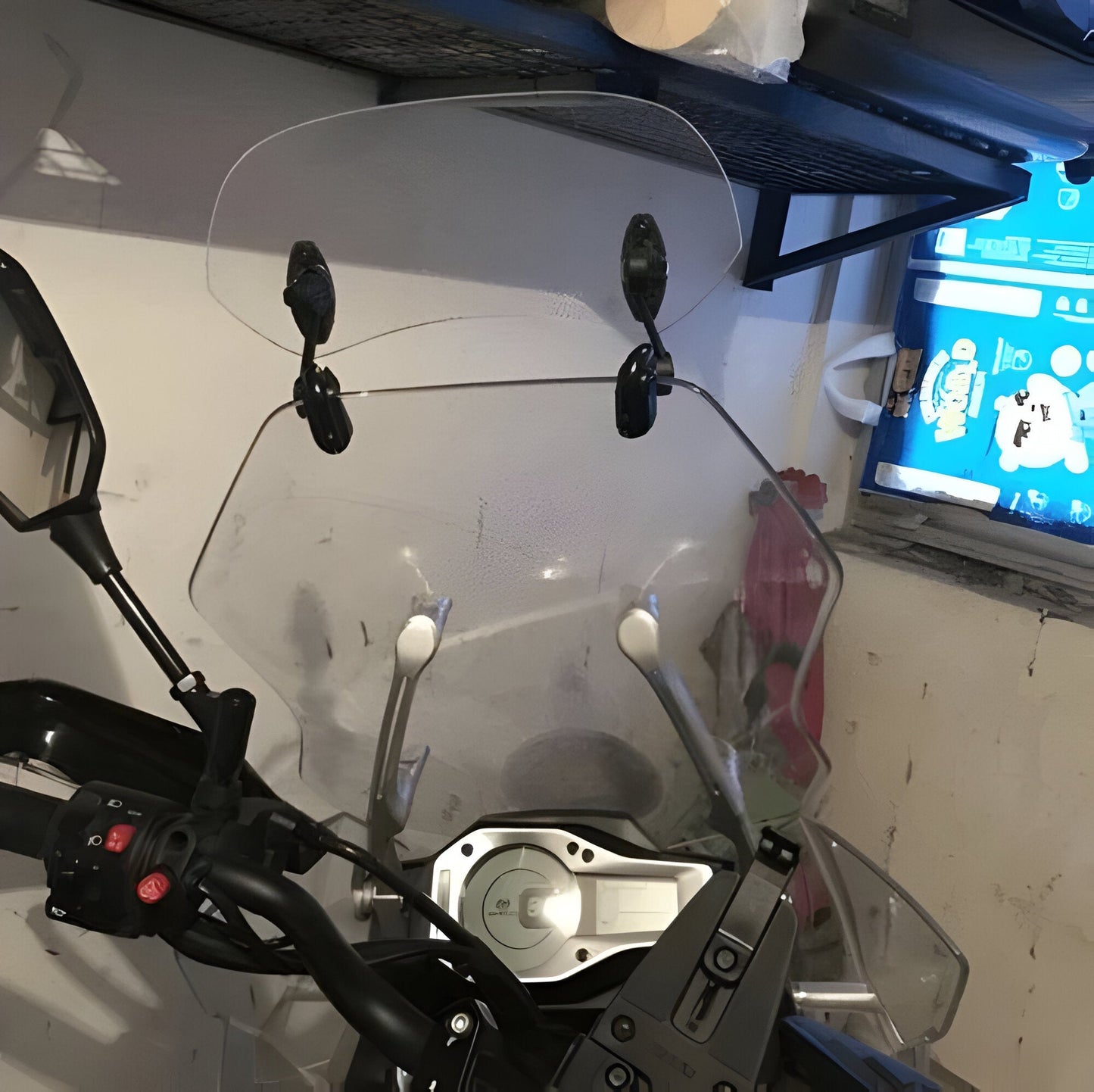 Adjustable Motorcycle Windshield Extension for Enhanced Wind Protection