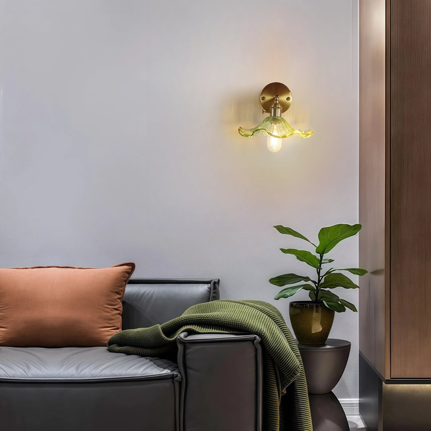 Curved Glass Wall Sconce with Brushed Brass Finish