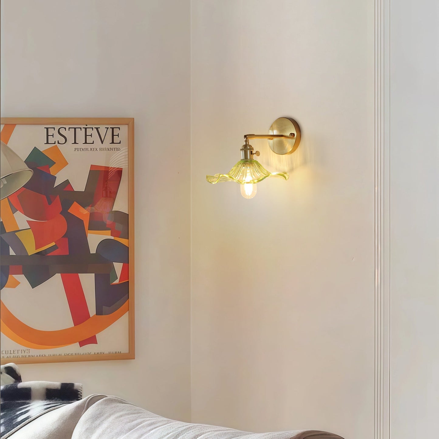 Curved Glass Wall Sconce with Brushed Brass Finish