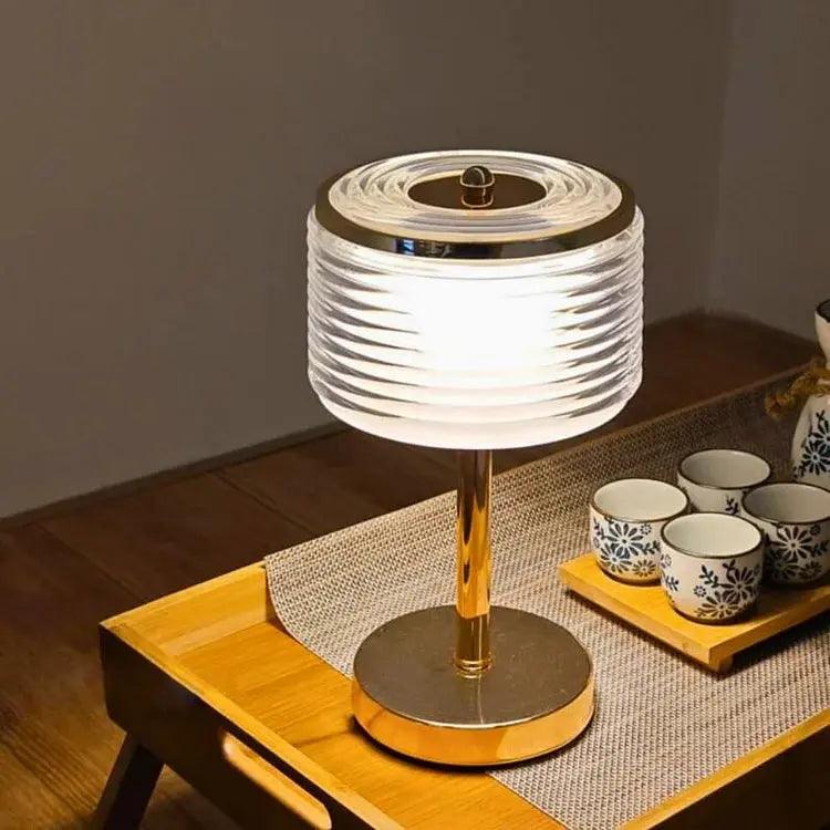 Gold Ring-Shaped Table Lamp with Customizable Light Tones
