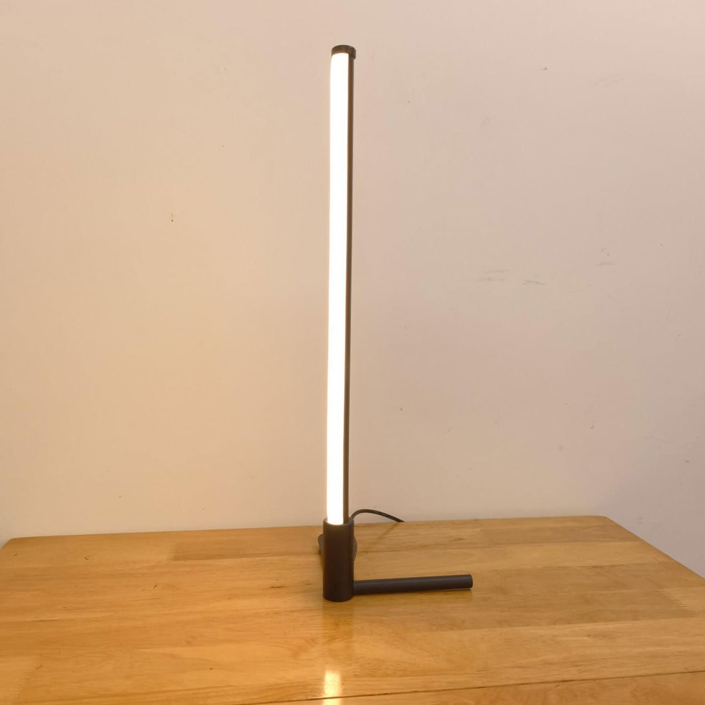 Minimalist LED Table Lamp with Adjustable Light Settings