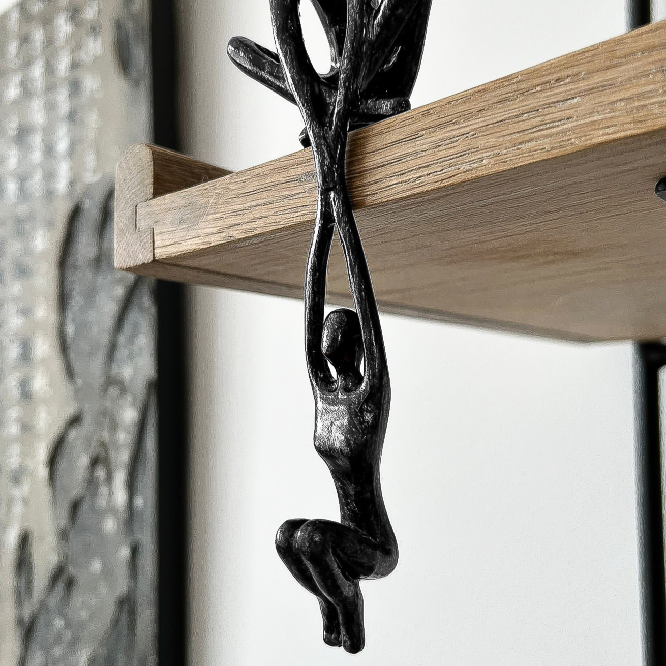 Abstract Couple Hanging Shelf Sculpture in Black Polystone