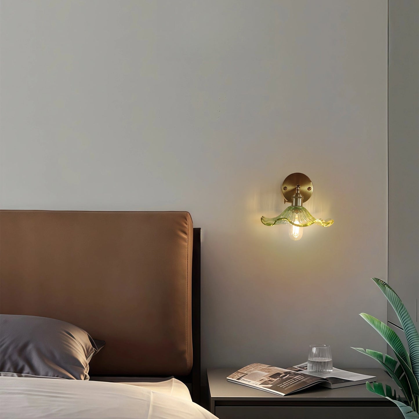 Curved Glass Wall Sconce with Brushed Brass Finish