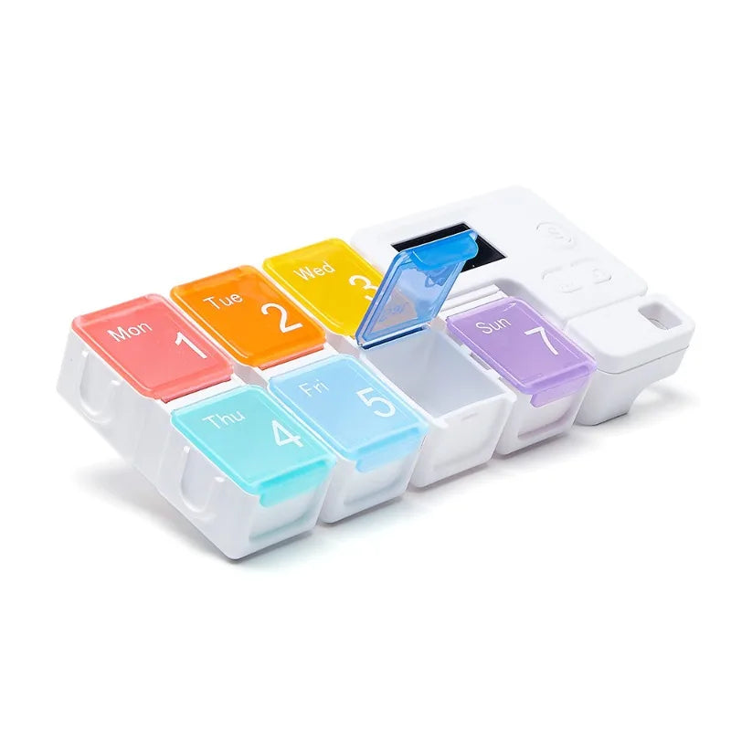 Electronic Weekly Pill Organizer with Alarms and Memory Function