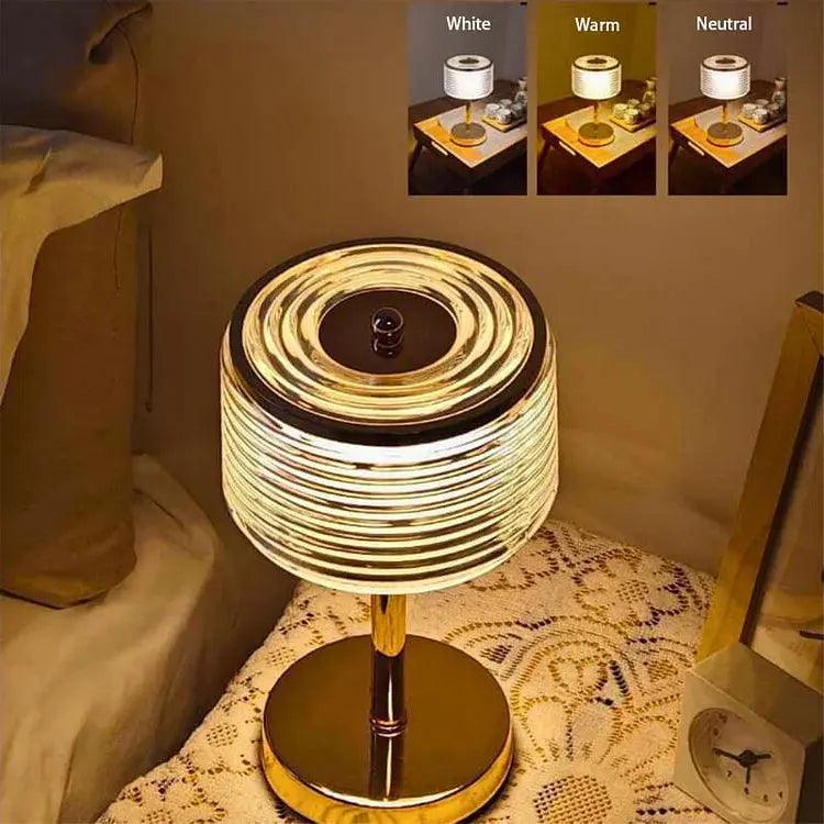 Gold Ring-Shaped Table Lamp with Customizable Light Tones