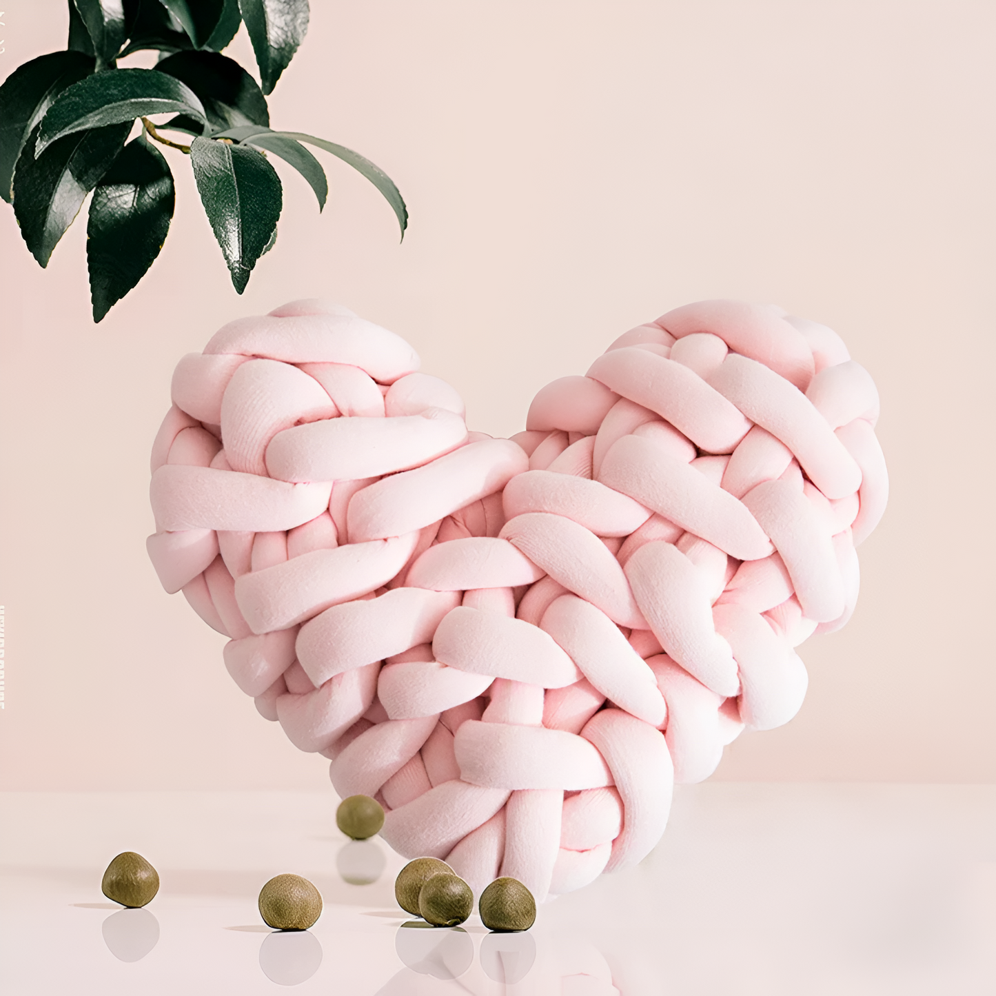 Plush Heart-Shaped Knotted Cushion
