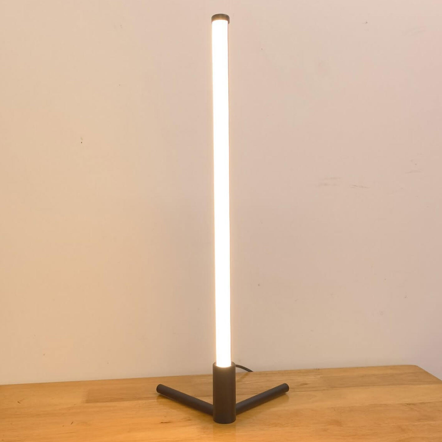 Minimalist LED Table Lamp with Adjustable Light Settings