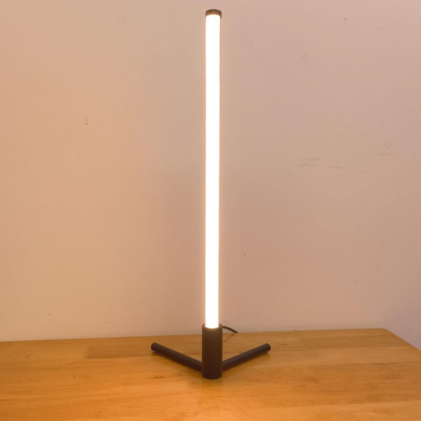 Minimalist LED Table Lamp with Adjustable Light Settings