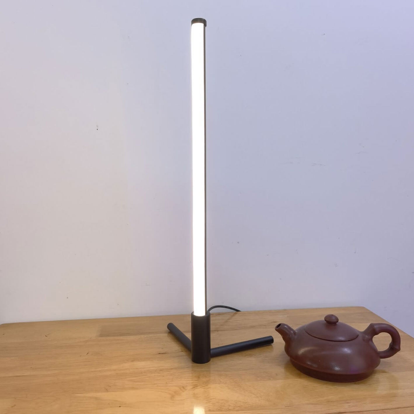 Minimalist LED Table Lamp with Adjustable Light Settings