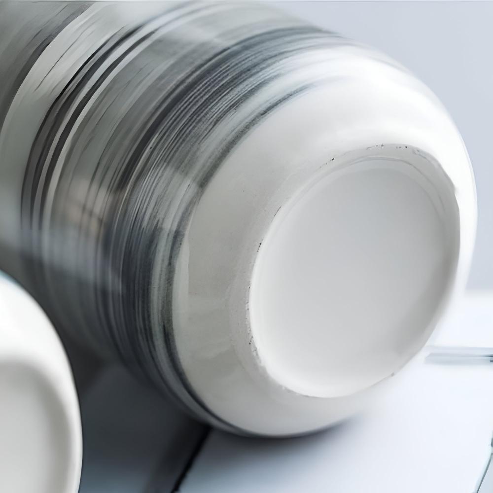 Textured Ceramic Soap Dispenser with Glossy Finish