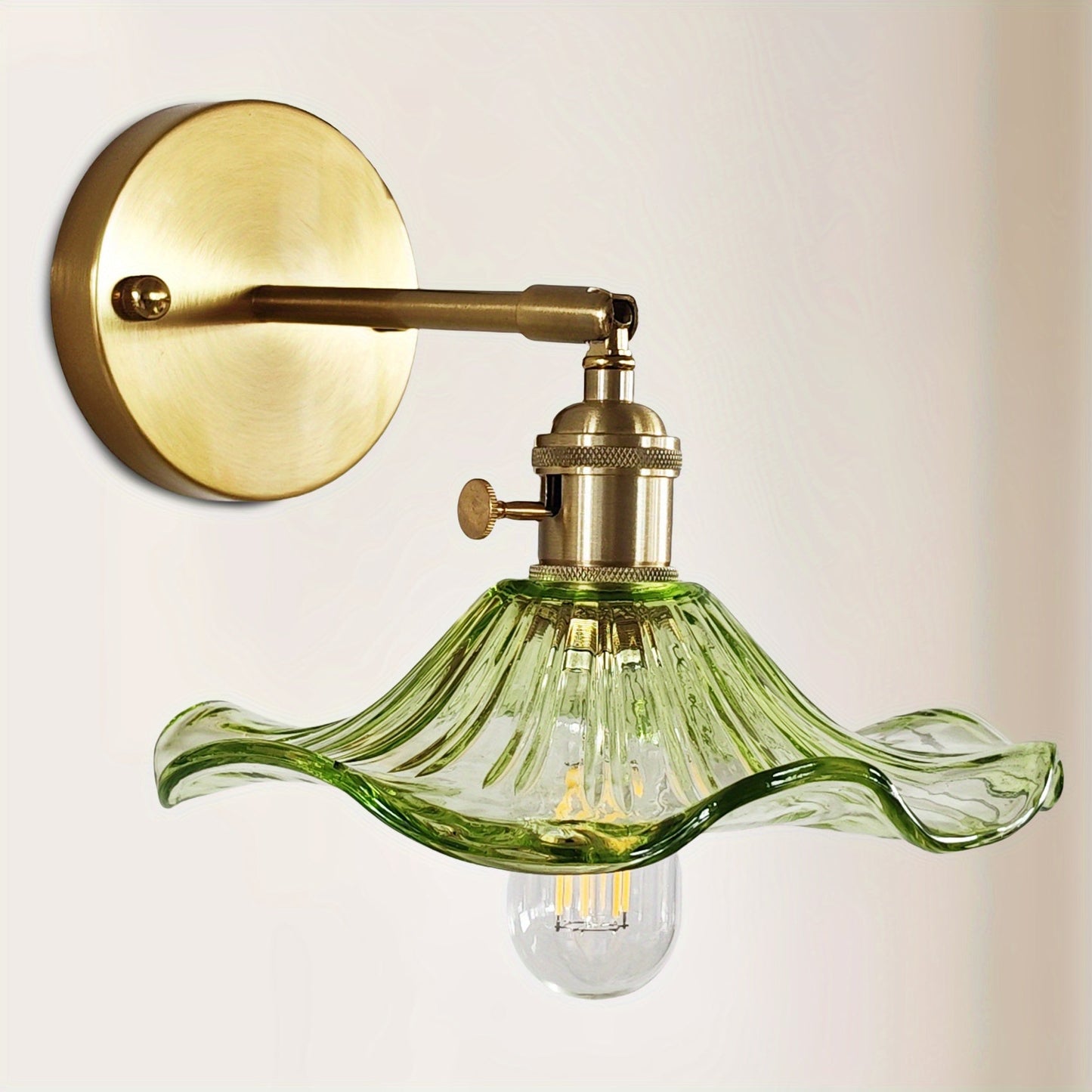 Curved Glass Wall Sconce with Brushed Brass Finish