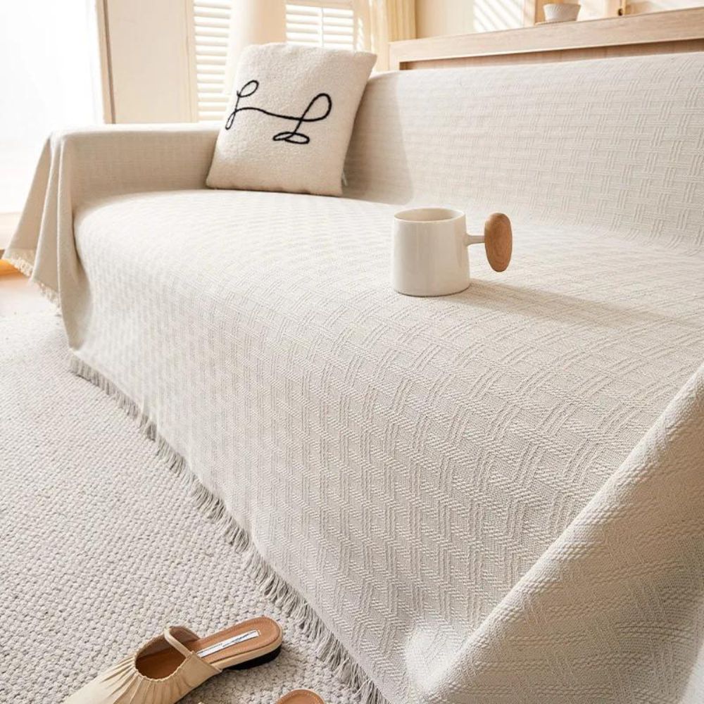 Geometric Quilted Sofa Cover with Tassels