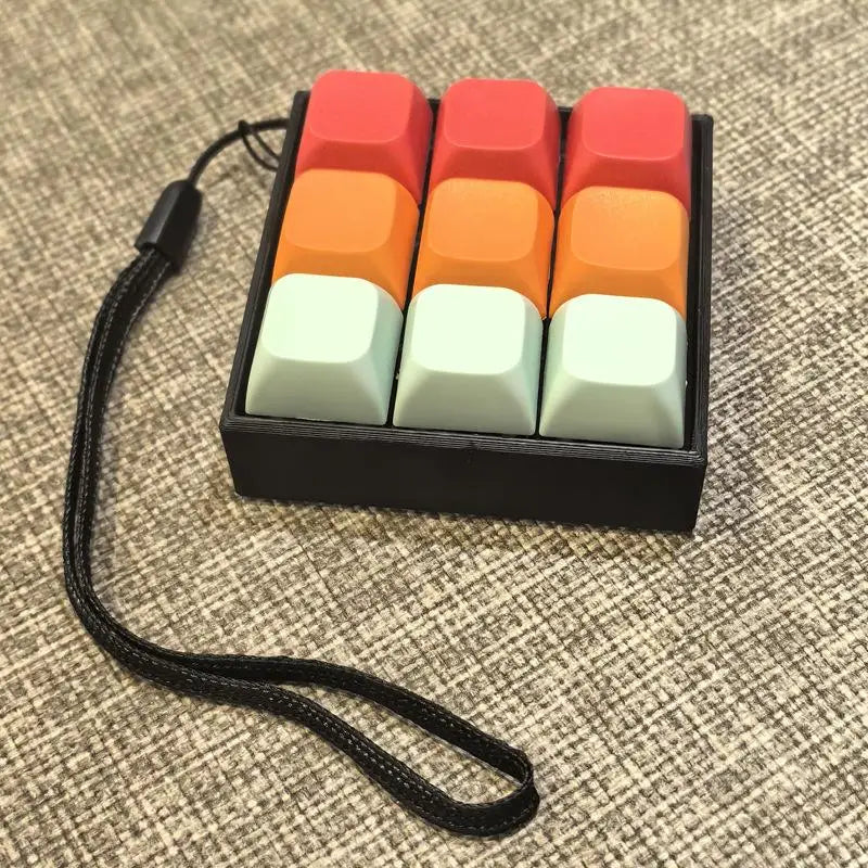 Compact Keychain Clicker with Tactile Buttons