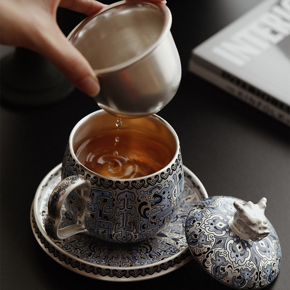 Taotie Pattern Silver-Plated Ceramic Tea Cup with Strainer and Saucer