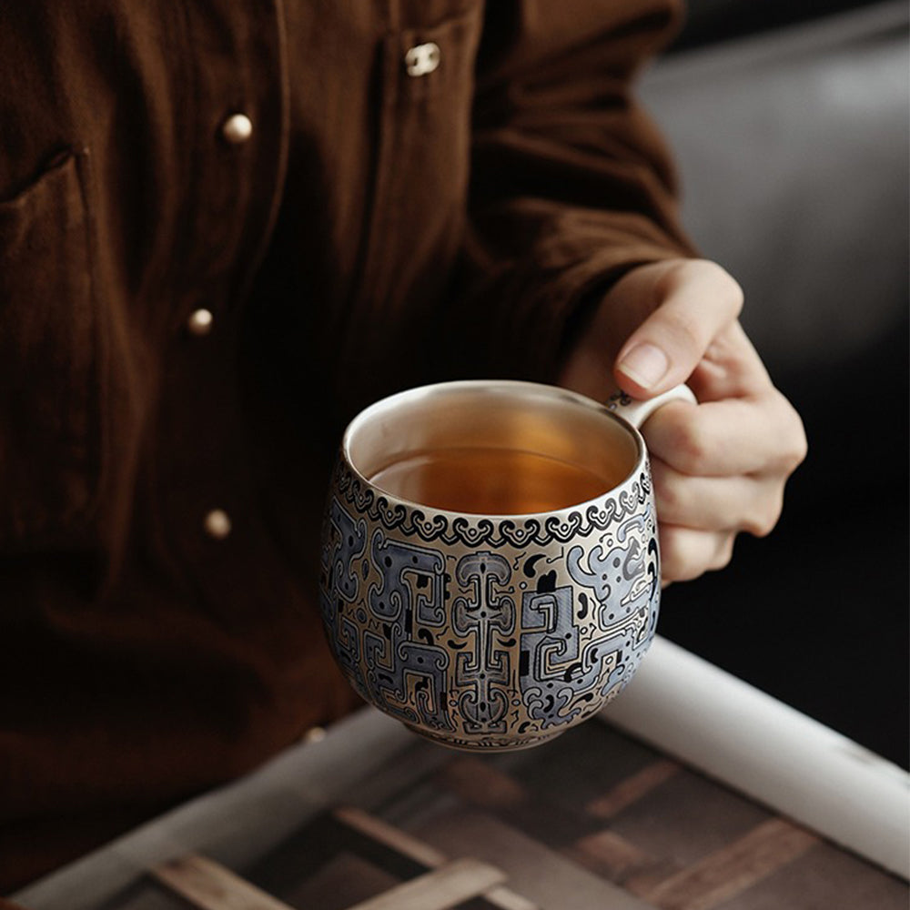Taotie Pattern Silver-Plated Ceramic Tea Cup with Strainer and Saucer