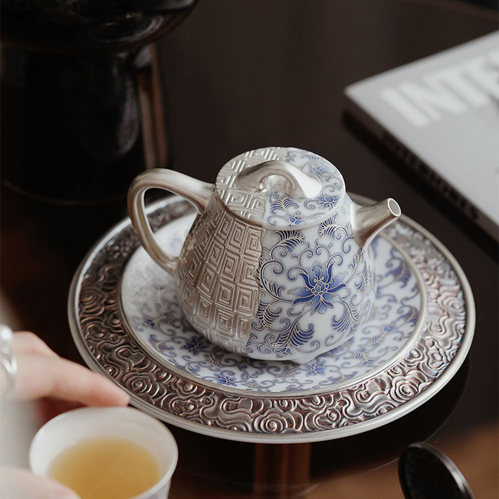 Silver-Gilt Blue and White Shi Piao Teapot with Lotus Design