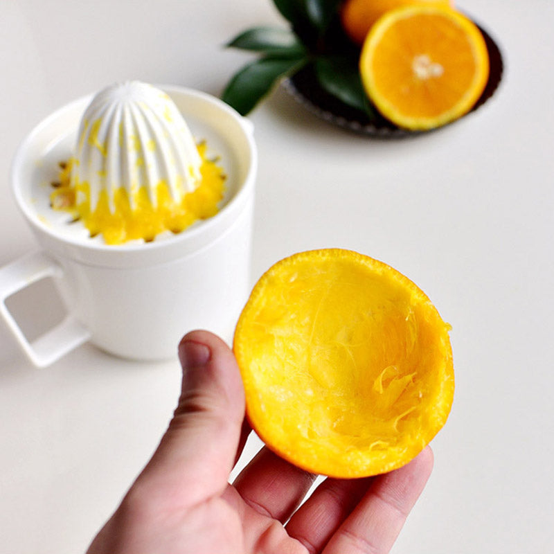 Ceramic Manual Citrus Juicer - Elegant White Design