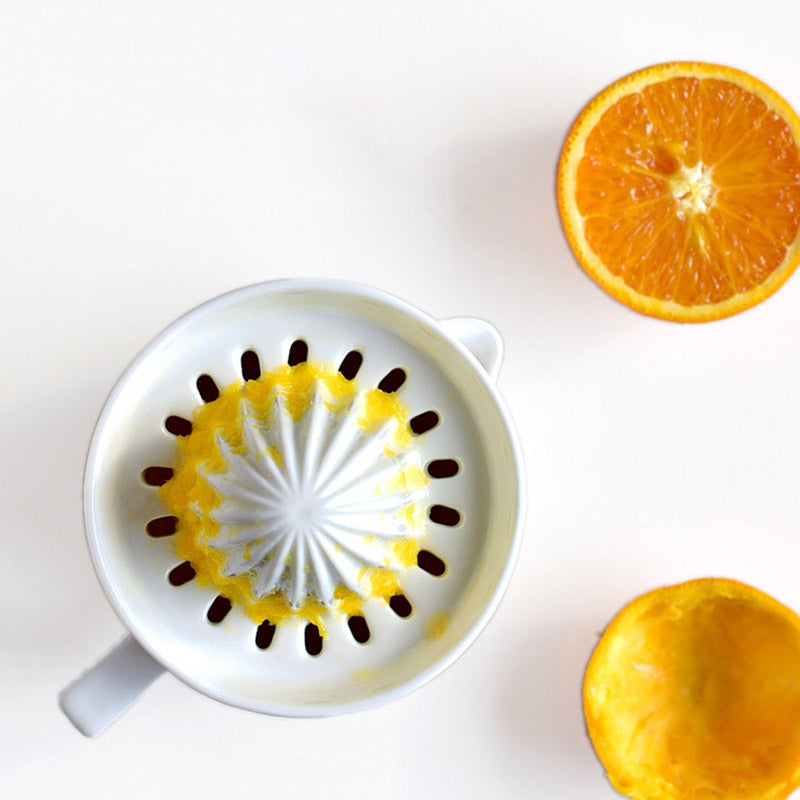 Ceramic Manual Citrus Juicer - Elegant White Design