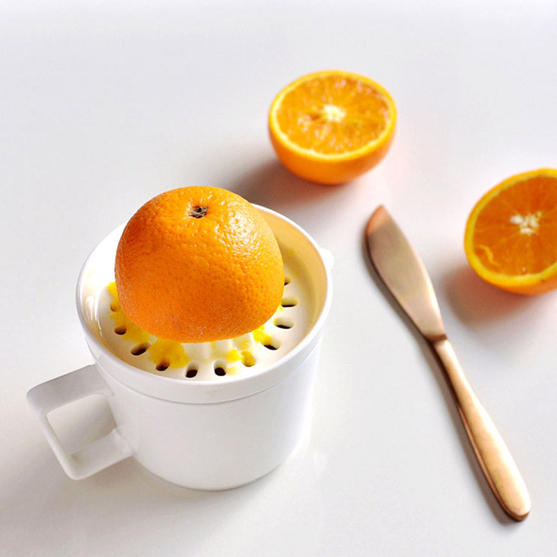 Ceramic Manual Citrus Juicer - Elegant White Design