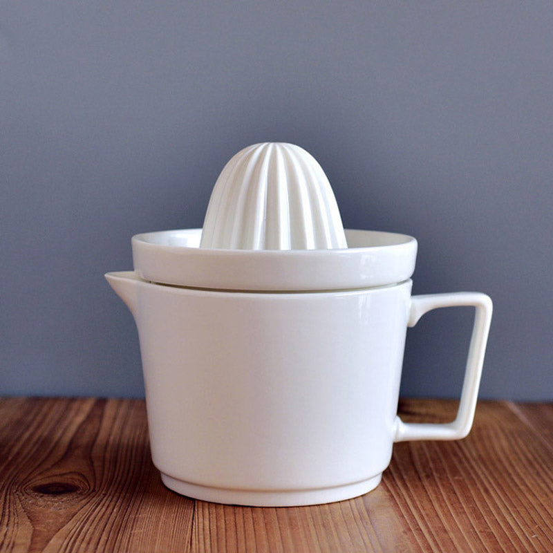 Ceramic Manual Citrus Juicer - Elegant White Design