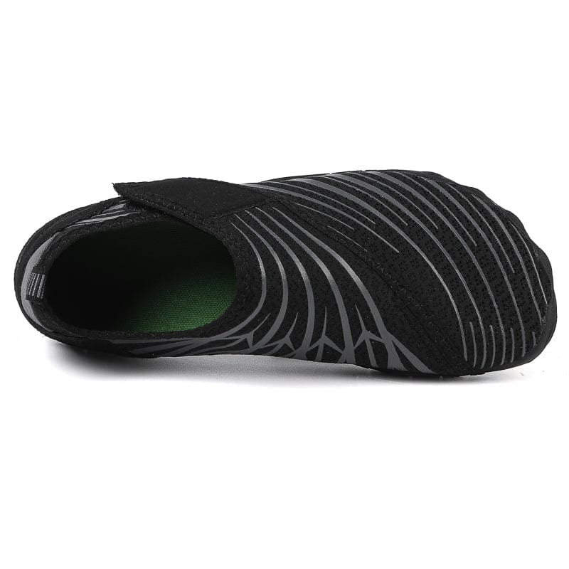 Slip-On Black Sports Shoes with Breathable Mesh and Ribbed Detailing