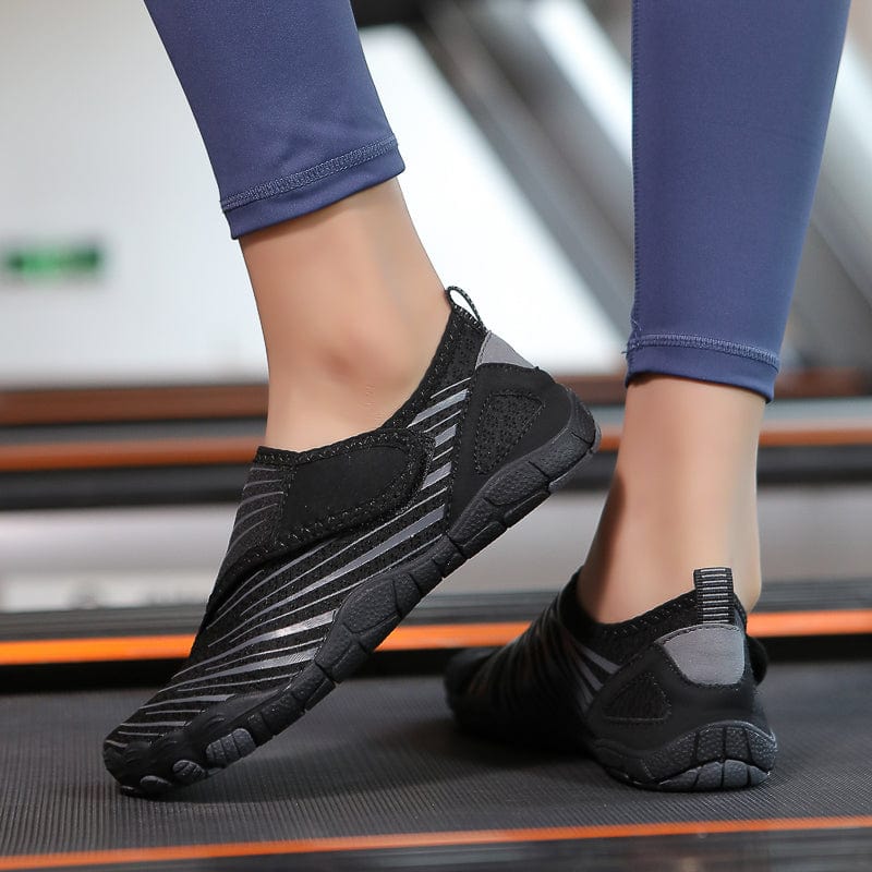 Slip-On Black Sports Shoes with Breathable Mesh and Ribbed Detailing