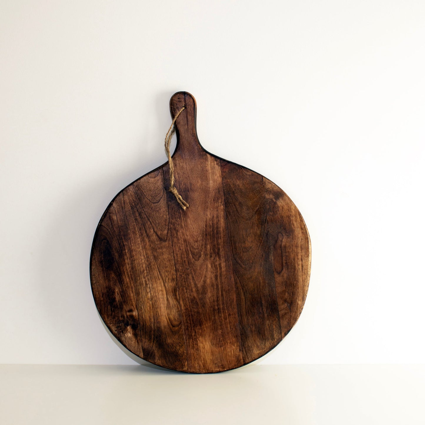 Irregular Round Dark Brown Mango Wood Chopping Board with Rope Handle