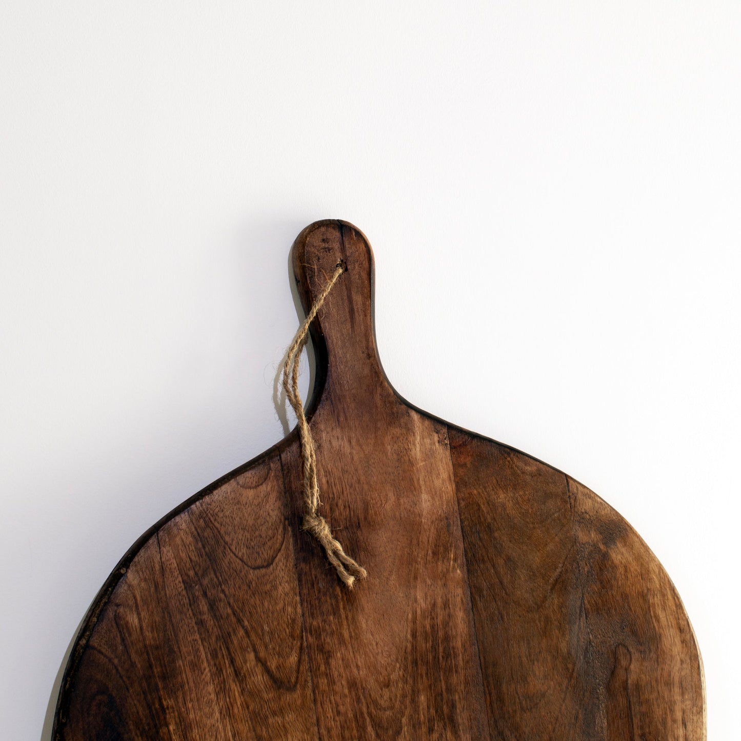 Irregular Round Dark Brown Mango Wood Chopping Board with Rope Handle