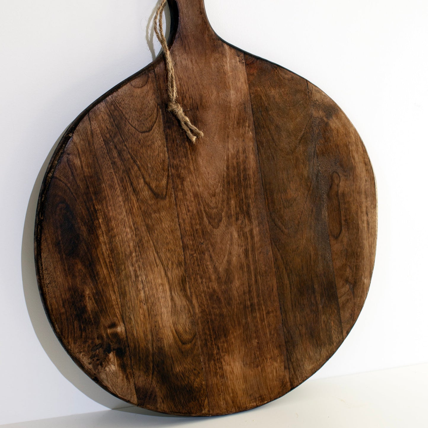 Irregular Round Dark Brown Mango Wood Chopping Board with Rope Handle