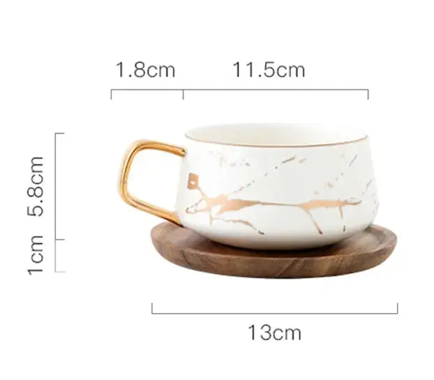 Marble Coffee Mug with Gold Accents and Wooden Coaster