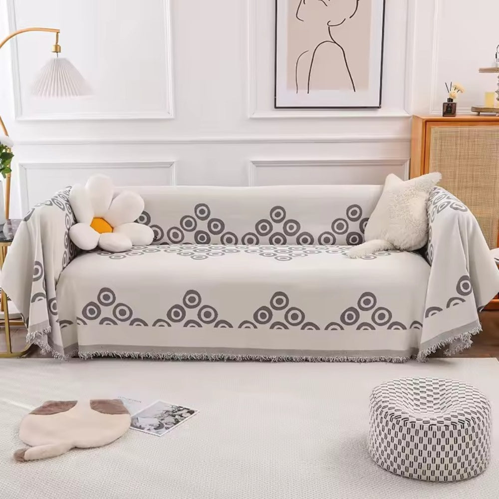 Chenille Sofa Cover with Circular Pattern and Tassel Accents