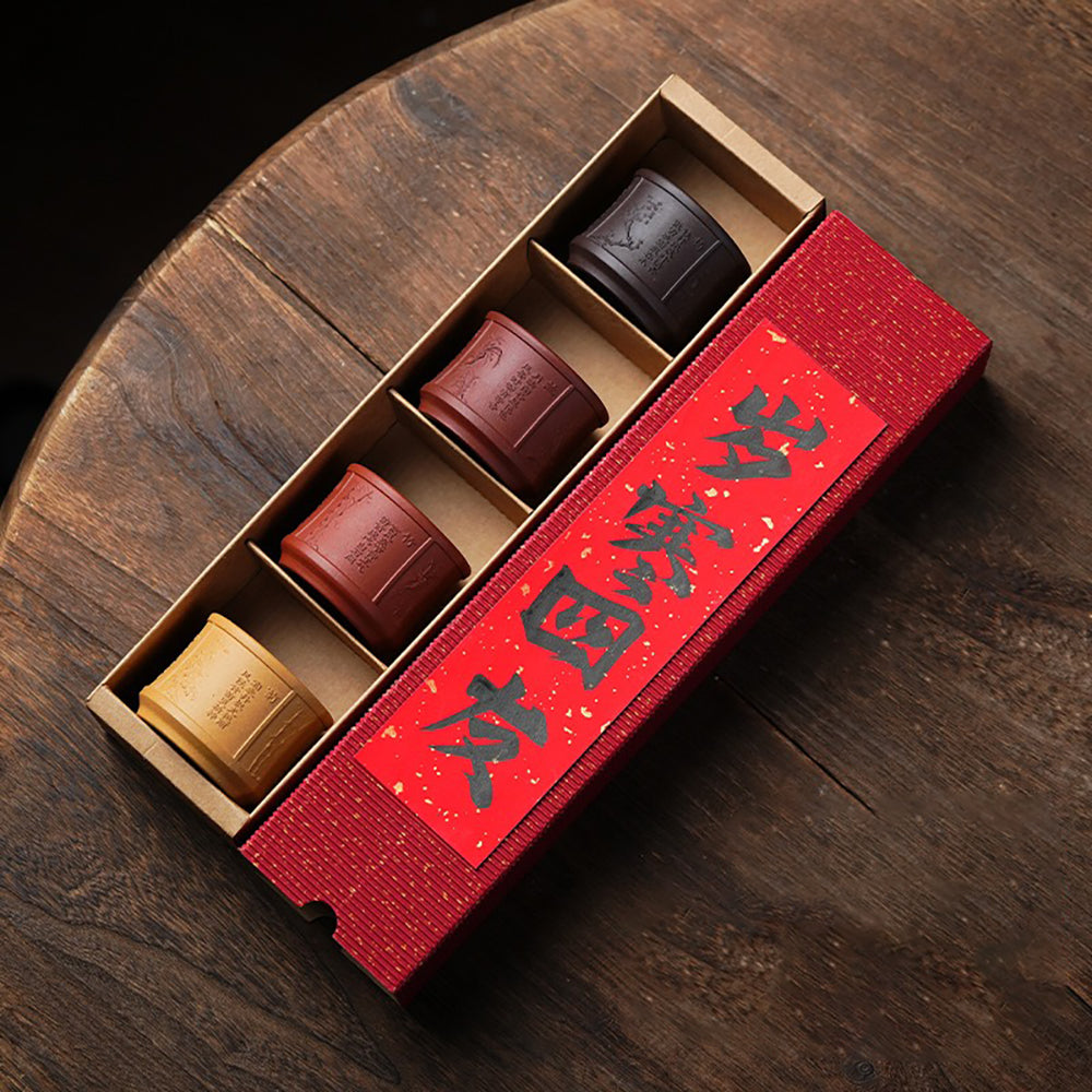 Yixing Purple Clay Tea Cup Set with Plum Blossom, Orchid, Bamboo, and Chrysanthemum Motifs