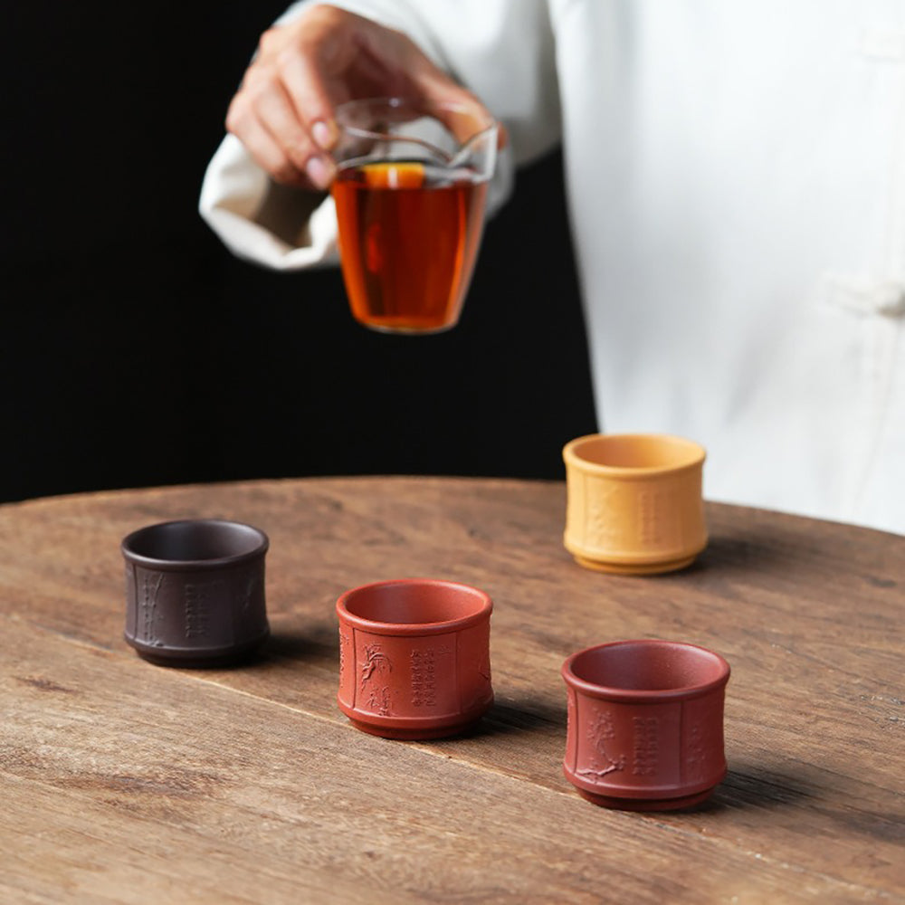Yixing Purple Clay Tea Cup Set with Plum Blossom, Orchid, Bamboo, and Chrysanthemum Motifs