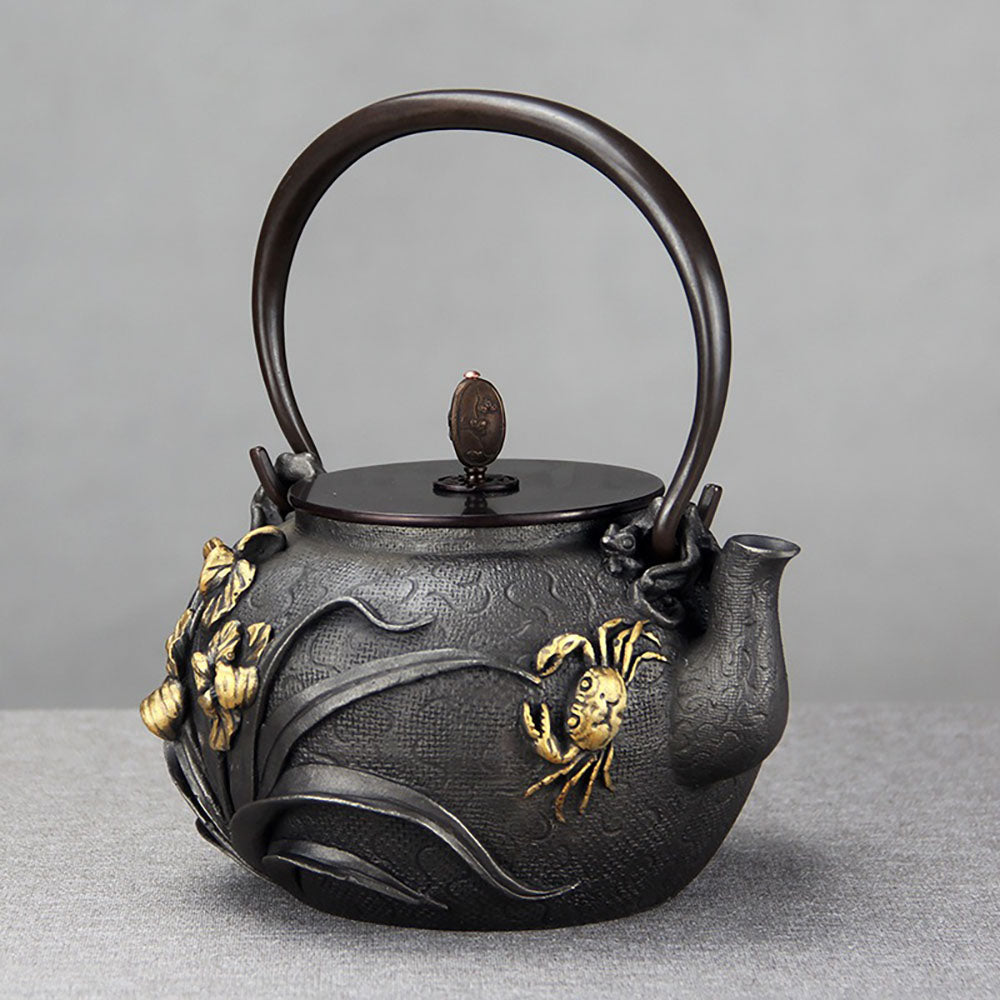 Japanese Cast Iron Teapot with Orchid and Crab Design