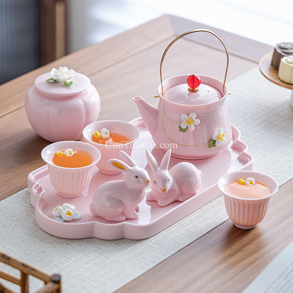 Pink Floral Porcelain Tea Set with Bunny Figurines