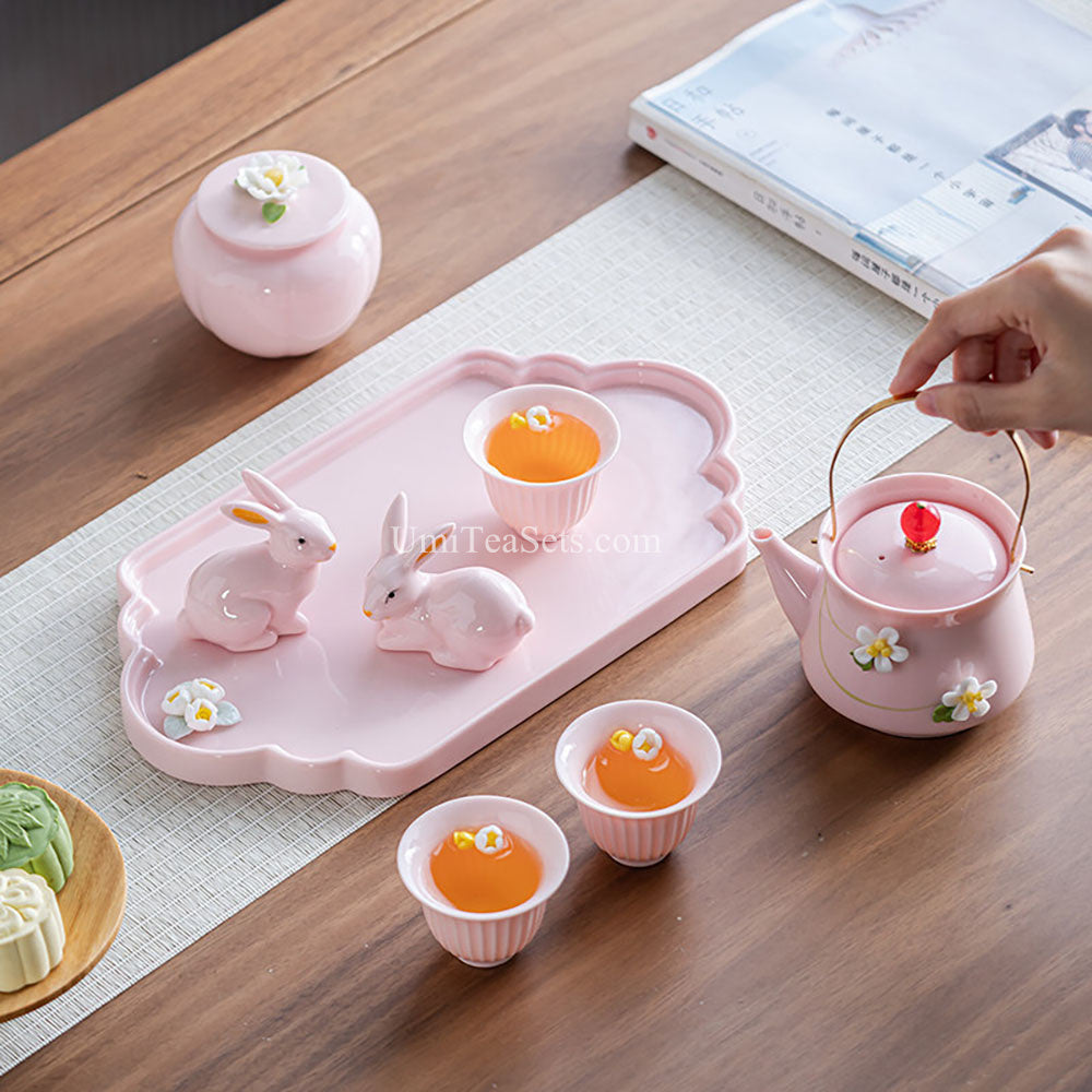 Pink Floral Porcelain Tea Set with Bunny Figurines