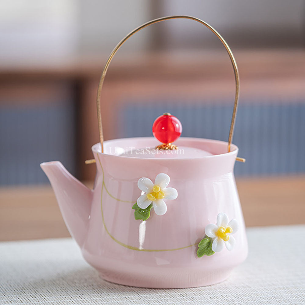 Pink Floral Porcelain Tea Set with Bunny Figurines