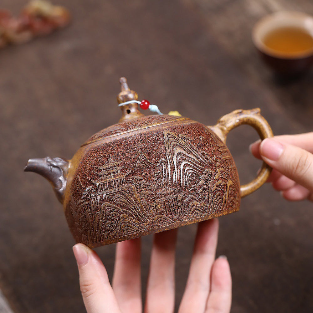 Yixing Dragon Bone Gold Sand Teapot with Landscape Carving