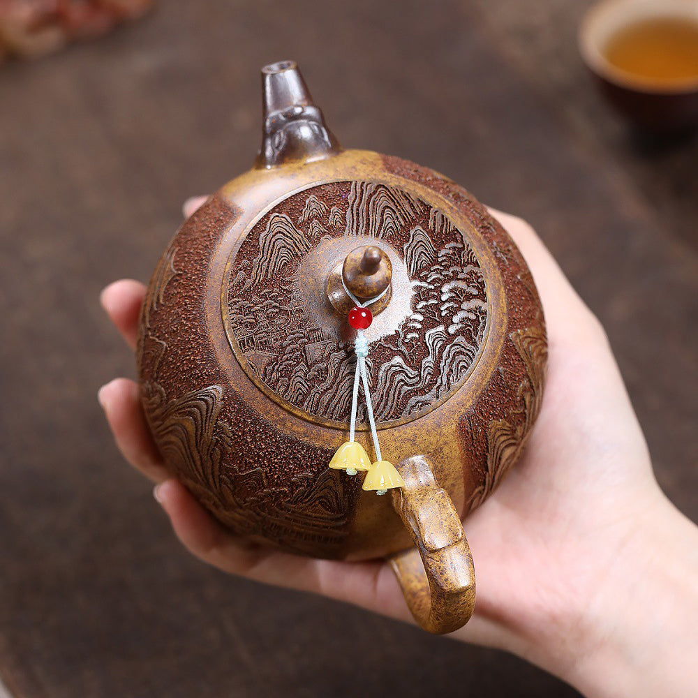 Yixing Dragon Bone Gold Sand Teapot with Landscape Carving