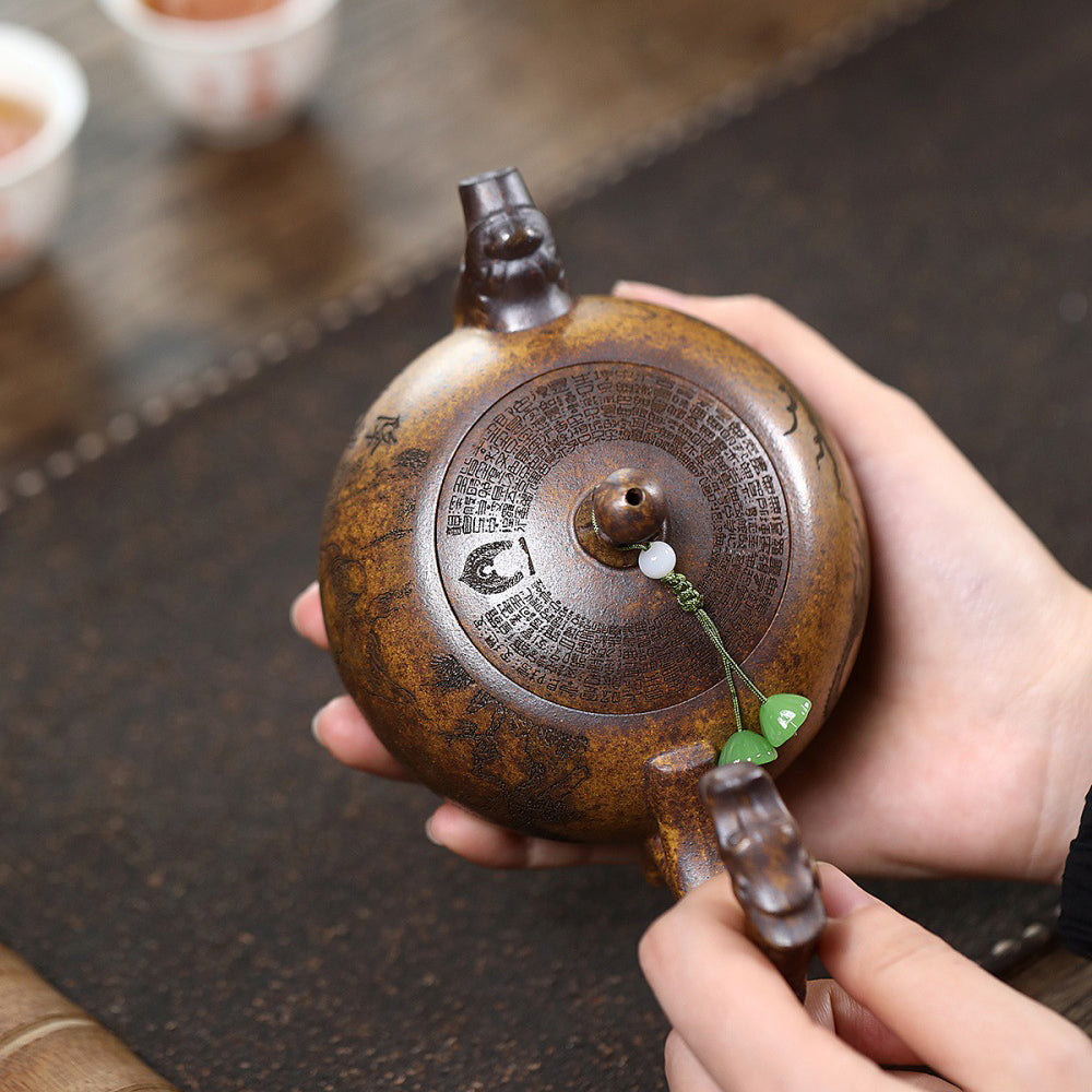 Yixing Dragon Bone Golden Sand Teapot with Luohan Design