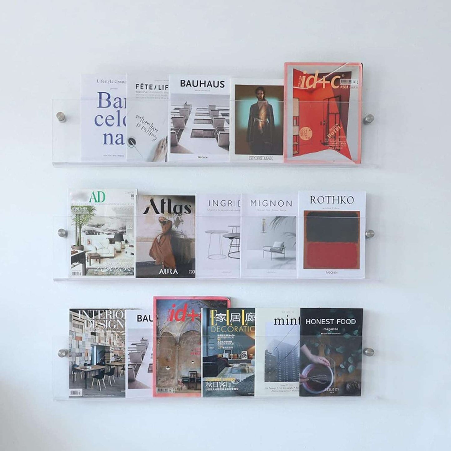 Acrylic Wall-Mounted Floating Magazine Rack in Clear and Orange