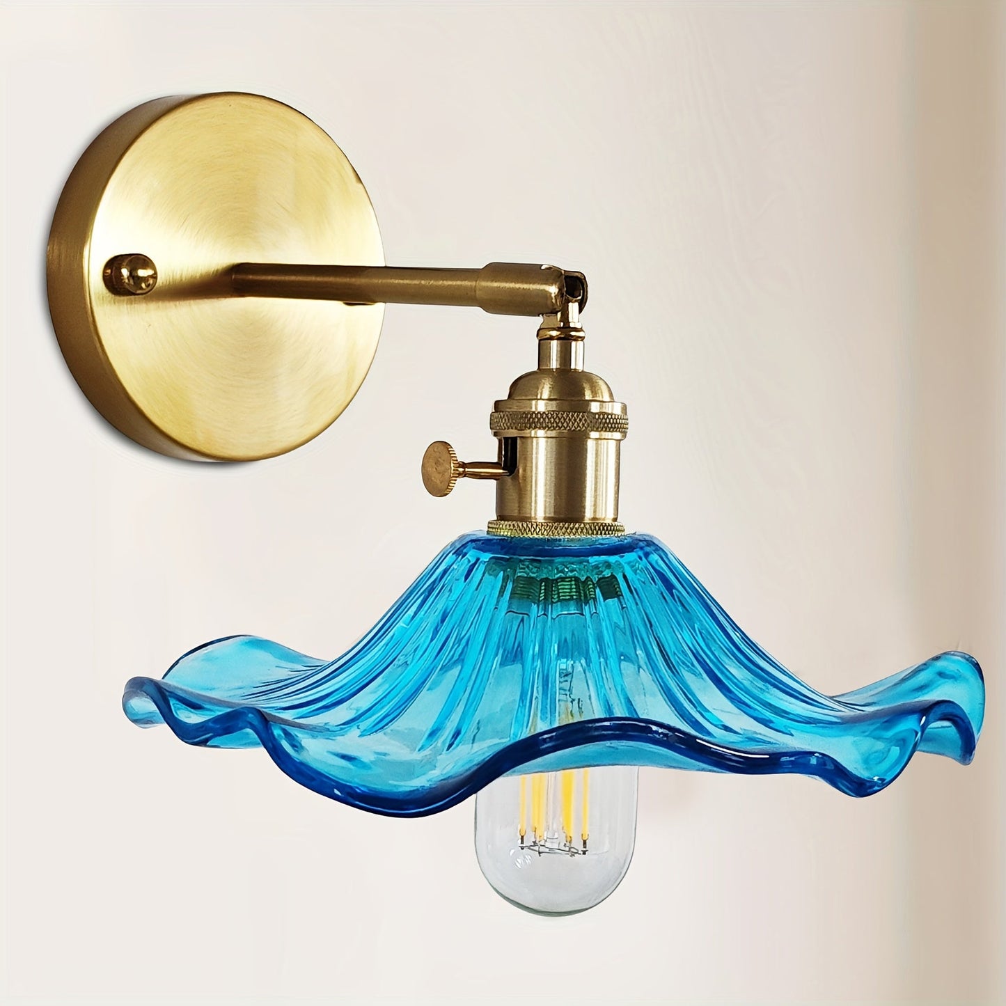 Curved Glass Wall Sconce with Brushed Brass Finish