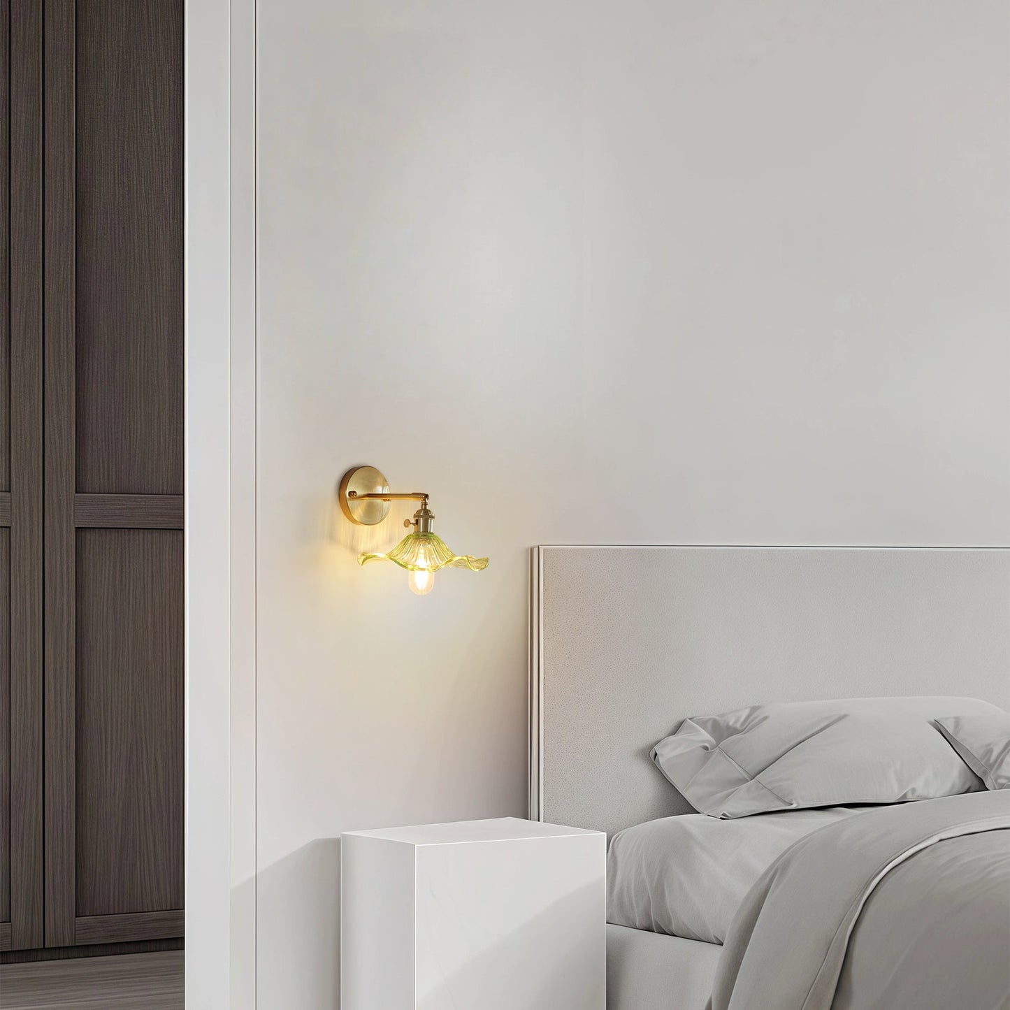 Curved Glass Wall Sconce with Brushed Brass Finish