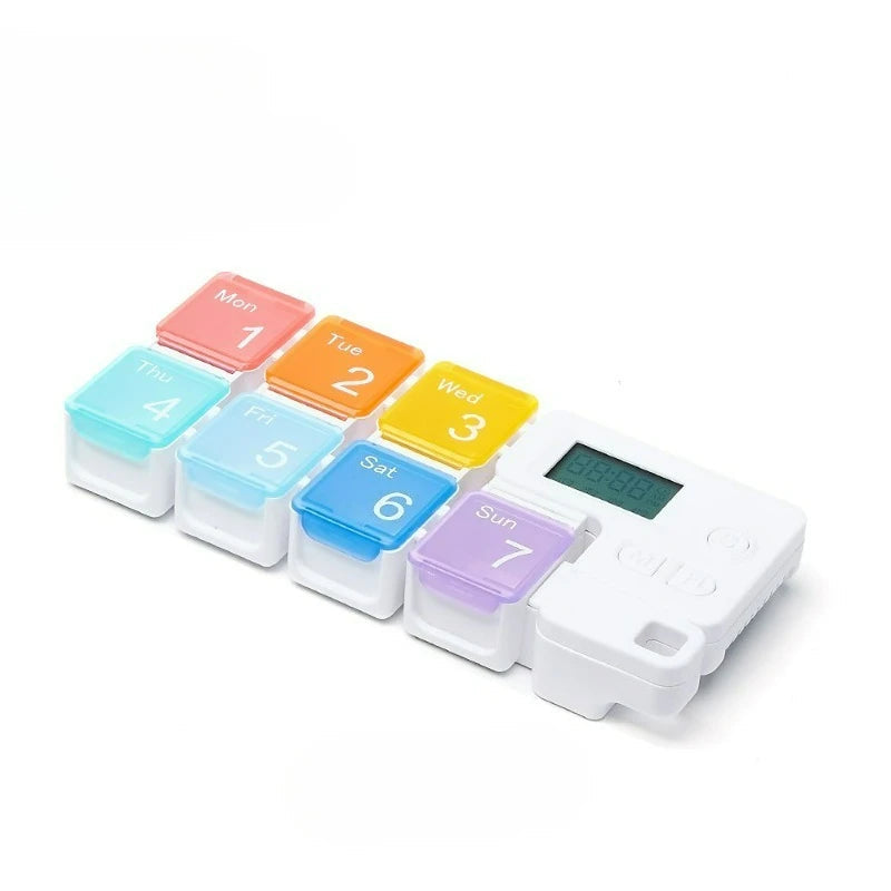 Electronic Weekly Pill Organizer with Alarms and Memory Function