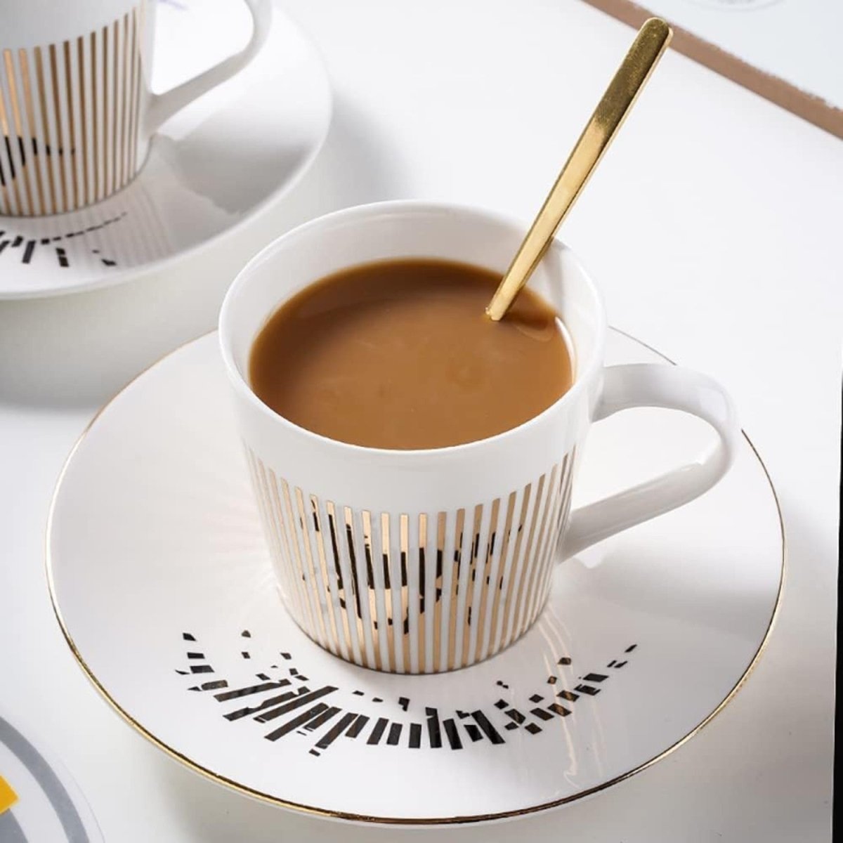 Mirrored Coffee Cup with Ergonomic Design