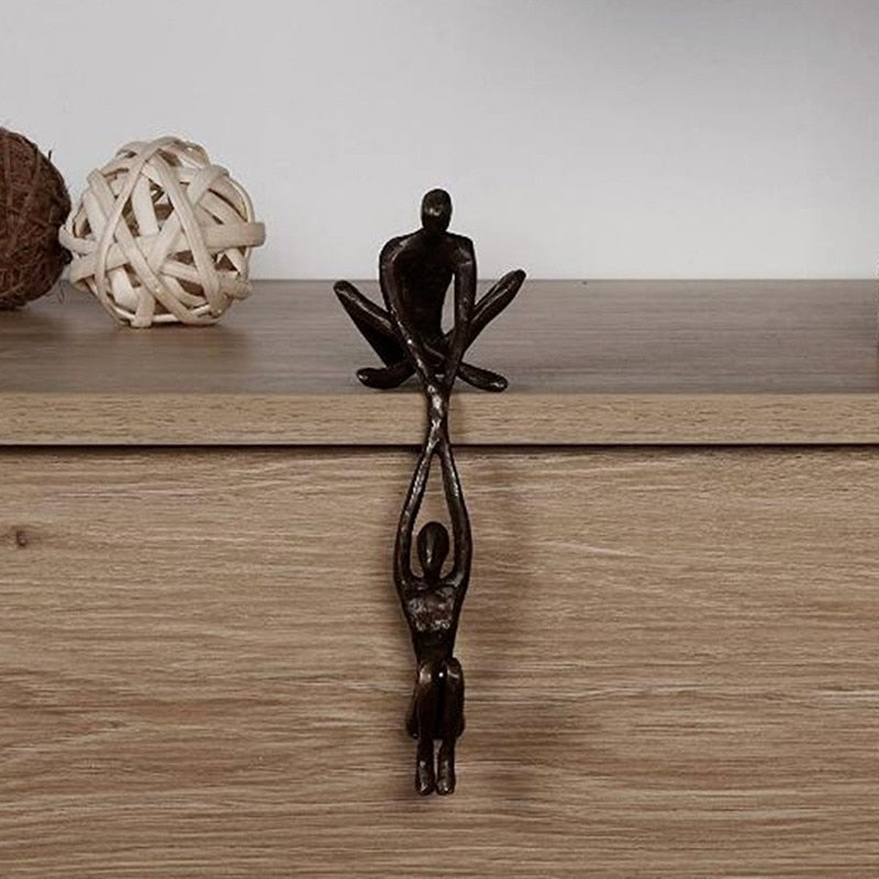 Figurative Sculpture of Man Lifting Woman - Balance and Elegance Decor