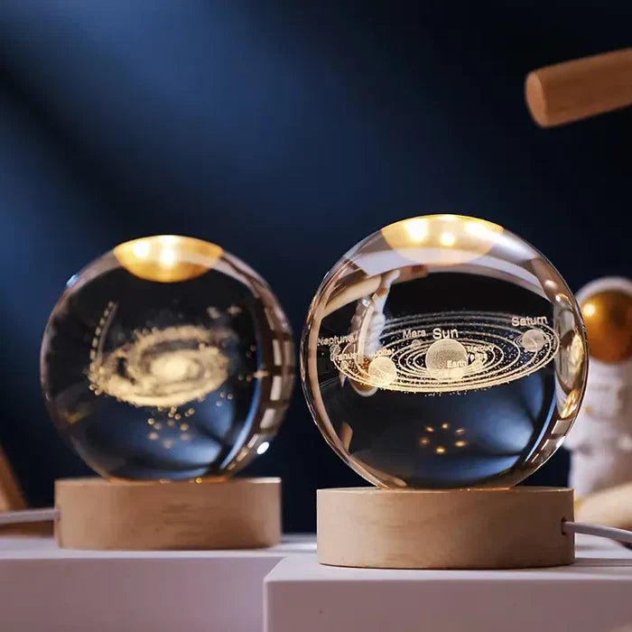 Glowing Celestial Sphere with 3D Planet Engravings